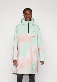 Lettvekts regnjakke med hette i mintgrønn og pastellrosa fargekombinasjon, halv-zip front og sidelommer. Slett tekstur og avslappet passform.