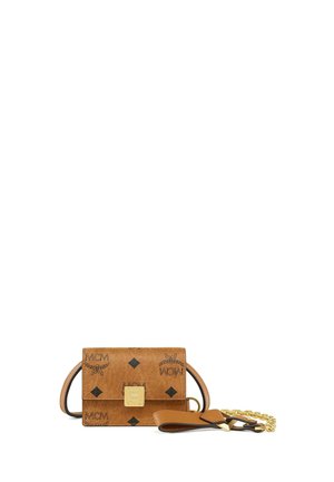 Small tan leather crossbody bag with black MCM logo patterns and a gold clasp, featuring a leather and gold chain strap.