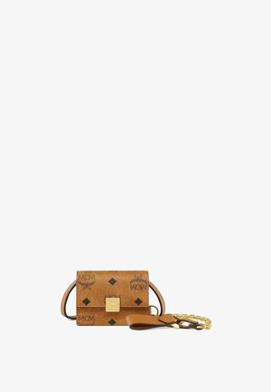 Small tan leather crossbody bag with black MCM logo patterns and a gold clasp, featuring a leather and gold chain strap.