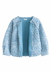 Giacca trapuntata di colore azzurro chiaro, con un motivo floreale, bottoni a pressione e una texture trapuntata a rombi sull'interno.