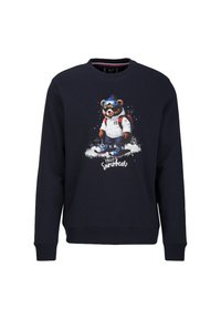Marinefarbener Pullover mit einem Grafikdesign eines Bären in Skiausrüstung, mit Skibrille und Rucksack, der im Schnee steht, mit dem Text "1969 Snowbear" darunter.