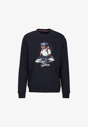 Marinefarbener Pullover mit einem Grafikdesign eines Bären in Skiausrüstung, mit Skibrille und Rucksack, der im Schnee steht, mit dem Text "1969 Snowbear" darunter.