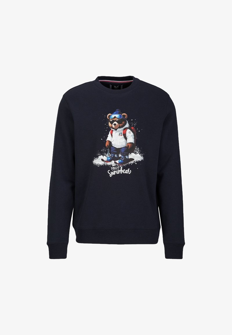 Marinefarbener Pullover mit einem Grafikdesign eines Bären in Skiausrüstung, mit Skibrille und Rucksack, der im Schnee steht, mit dem Text "1969 Snowbear" darunter.