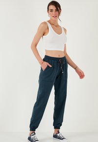 LELA REGULAR FIT - Donji dijelovi trenirke - dark blue