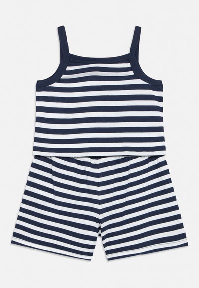 Αμάνικο τοπ με οριζόντιες ρίγες σε ναυτικό μπλε και λευκό χρώμα και ταιριαστό σορτς με ελαστική μέση.