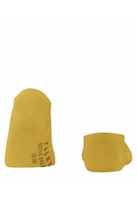 Gelbe Knöchelsocken mit glattem Material, die ein Band an der Oberseite und einen gedruckten Markenlogo an der Seite haben. Keine auffälligen Muster oder Akzente.