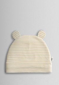 Krémová a béžová károvaná pletená čiapka s guľatými medvedími uškami, so zrolovaným lemom a malou štítkom na boku. Mäkká textúra.