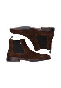 Bottines Chelsea en daim marron avec panneaux latéraux élastiques, bout arrondi et languette. Talon en bois avec semelle texturée pour une bonne adhérence.
