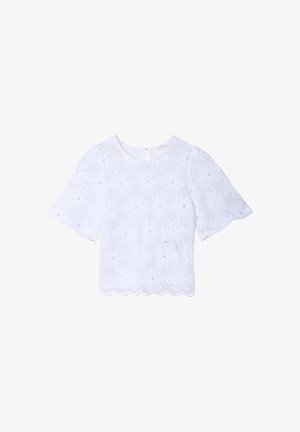 Weißes Spitzenoberteil mit kurzen, schwingenden Ärmeln, rundem Ausschnitt und gewelltem Saum. Das Muster zeigt florale Motive und strukturierte Details.