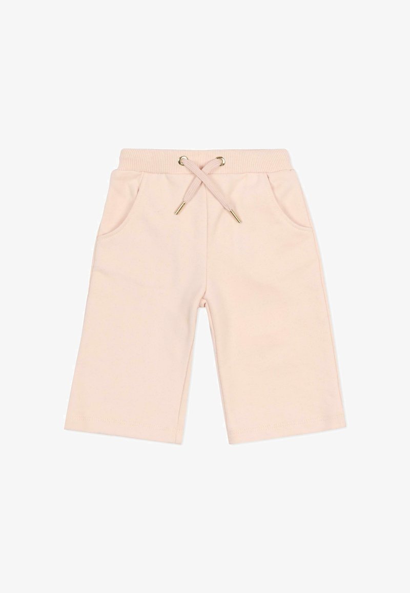 Shorts roses clairs mi-cuisse avec taille élastique, cordon de serrage et poches latérales, présentés sur un fond blanc.
