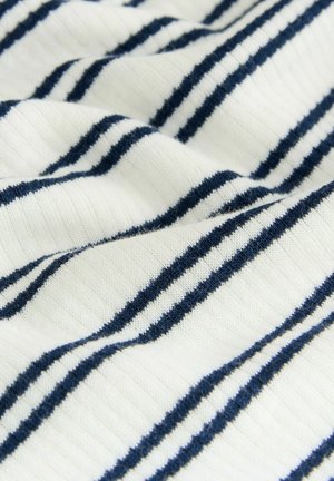Cotton fabric with white and navy stripes, featuring a ribbed texture and soft surface. The stripes are of varying widths.