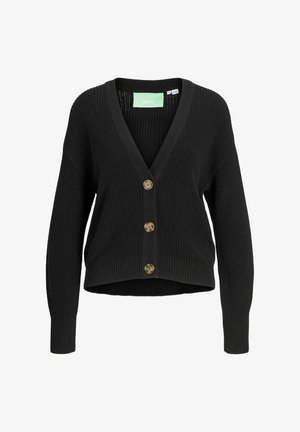 Mustard värvi lühike kardigan, mis on valmistatud ribakudumist, V-kaelusega, pikkade varrukatega ja viie kuldse nööbiga ees.