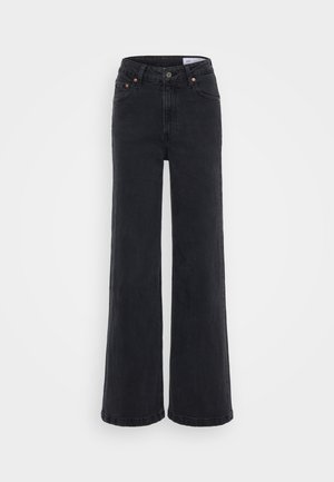 Black wide-leg jeans made of denim, featuring a high waist, button closure, and orange stitching accents. Smooth texture with minimal fading.
