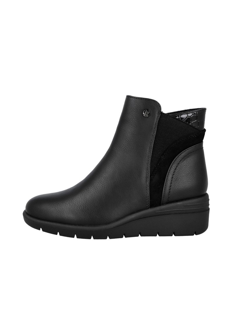 Botines negros con parte superior de cuero liso, paneles laterales elásticos y un respaldo texturizado. Cuenta con un tacón en cuña y suela de goma.