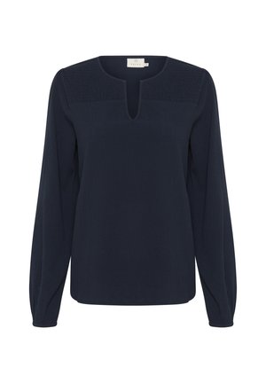 Donkerblauwe blouse met lange mouwen, een ronde hals en een sleutelgatopening. Textuurpaneel op de schouders. Zacht, vallend materiaal.