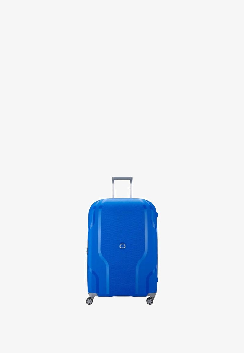 Valigia rigida blu con superficie texturizzata, dotata di manico telescopico, due ruote e forma arrotondata con linee di design sottili.