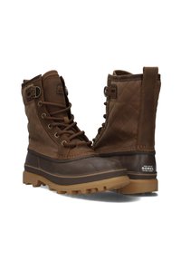Brown waterproof boots with quilted nylon upper, lace-up design, rubber sole, and Sorel branding on the heel. Features metal hardware accents.