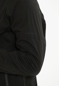 Endurance KOMINT - Runningjack -  black