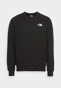 Sudadera negra de cuello redondo con mangas largas y pequeño logo blanco "The North Face" en el lado izquierdo del pecho.