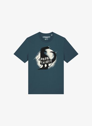 Teal T-Shirt aus Baumwolle mit kurzen Ärmeln. Verfügt über ein schwarzes Dinosaurier-Motiv und den Text "PAPA SAURUS" in Weiß, eingebettet in ein kreisförmiges Design.