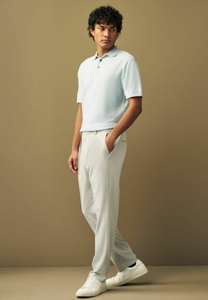 BUBBLE TEXTURE - REGULAR FIT - Polo - light blue