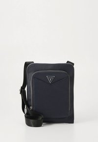 Křížová taška námořnické modré barvy z nylonu, s trojúhelníkovým logem, přední kapsou na zip a nastavitelným popruhem pro pohodlí.