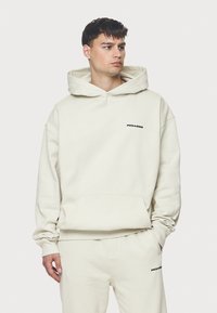 Pegador LOGO OVERSIZED  - Jersey con capucha - washed salty cream
