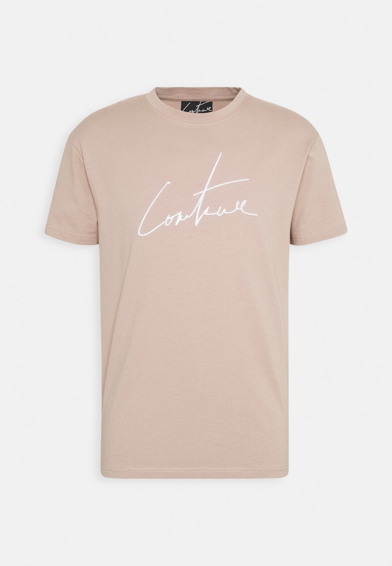 Jas-beżowy t-shirt wykonany z bawełny, z krótkimi rękawami, okrągłym dekoltem i kontrastowym, białym, kursywnym logo "Couture".