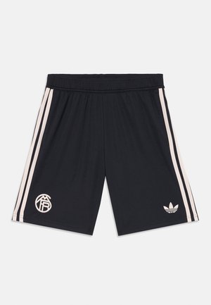Shorts de sport noirs avec une taille élastique, ornés de deux rayures rose clair sur les côtés et de logos brodés à l'avant.