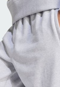 adidas Originals PREMIUM ESSENTIALS OPEN HEM - Tracksuit bottoms - light grey heather