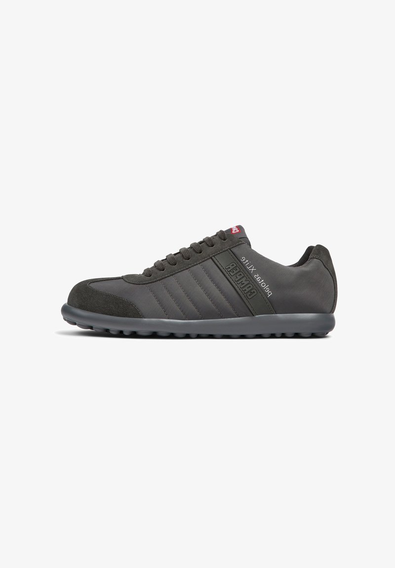 Dark grey sneakers with a smooth leather and suede upper, featuring textured stripes, rubber sole, and a logo on the side and tongue.