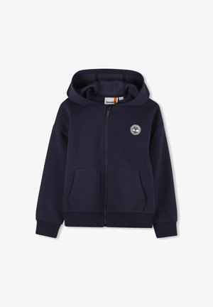 Sweat à capuche zippé bleu marine fabriqué en coton doux, avec un patch logo sur le devant, deux poches latérales et des poignets et un ourlet côtelés.