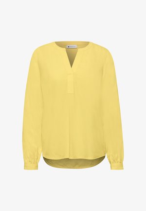 Keltainen pitkähihainen paita, jossa V-kaula-aukon leikkaus ja kerätyt kalvosimet, merkiltään "Street One", valkoisella taustalla.