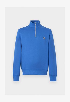 Blå langærmet sweatshirt med kvart lynlås, ståkrave og lille farverig zebra-patch på venstre bryst.