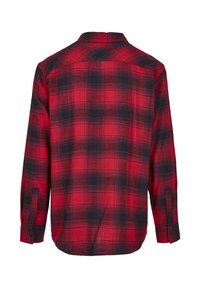 Chemise à carreaux rouge et noir, manches longues, poignets à boutons, tissu doux, col classique, présentant un motif à carreaux distinctif sur toute la surface.