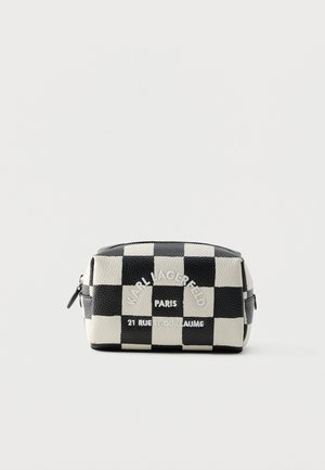 Must-valge ruuduline ristkülikukujuline kotike tõmblukuga, ees tikandiga "Karl Lagerfeld Paris 21 Rue St-Guillaume".