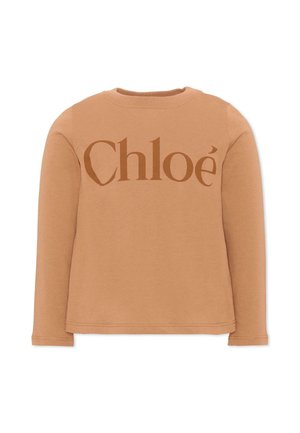 Sweat-shirt marron camel à manches longues avec un col rond et un grand logo "Chloé" imprimé sur la poitrine.