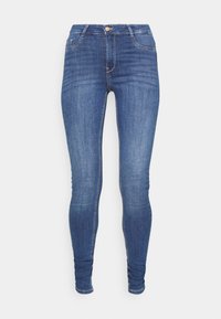 Jeans skinny de denim azul escuro com uma cintura alta, apresentando um design de cinco bolsos e leves desgastes na parte da frente.