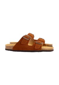 Sandales en suede marron avec deux sangles ajustables, semelle en liège, semelle en caoutchouc plate et design découpé sur les côtés.
