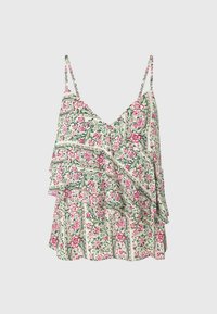 Bloemen camisole top met dunne bandjes, voorzien van een volants overslag. Het materiaal is licht met een roze en groene print op een crèmekleurige achtergrond.