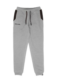 Grijze joggingbroek met een tailleband met trekkoord, zijzakken in donkere stof en een "SPALDING"-logo op de linker dij. Zachte katoenen stof.