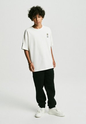DEXT UNISEX - T-shirt z nadrukiem