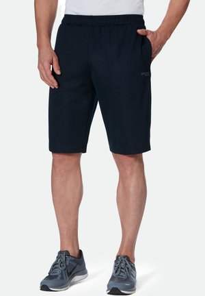 Marineblaue Sportshorts mit elastischem Bund, Seitentaschen und glatter Stoffstruktur. Logodetail am linken Bein.