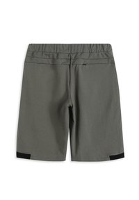 Pantalones deportivos grises con cintura elástica, bolsillo trasero y detalles negros en el dobladillo. Textura suave y diseño de pierna recta.