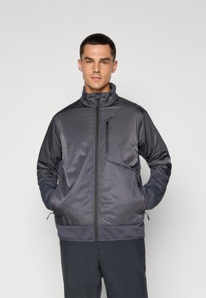 Graue Zip-Jacke mit hohem Kragen, strukturiertem Stoff, vorderer Reißverschlusstasche und elastischen Bündchen, entworfen für Komfort und Funktionalität.