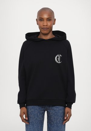 Black hoodie with a kangaroo pocket and ribbed hem. Features decorative logo embroidery on the left chest. Soft, textured fabric.