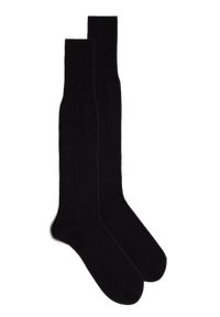 Calcetines de algodón negros de corte crew con puño acanalado, textura suave y punta reforzada, adecuados para uso casual o formal.