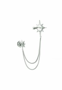 Silver metal ear cuff featuring a star design with pointed tips. Chain detail connects to a small star accent. Sleek, polished finish.