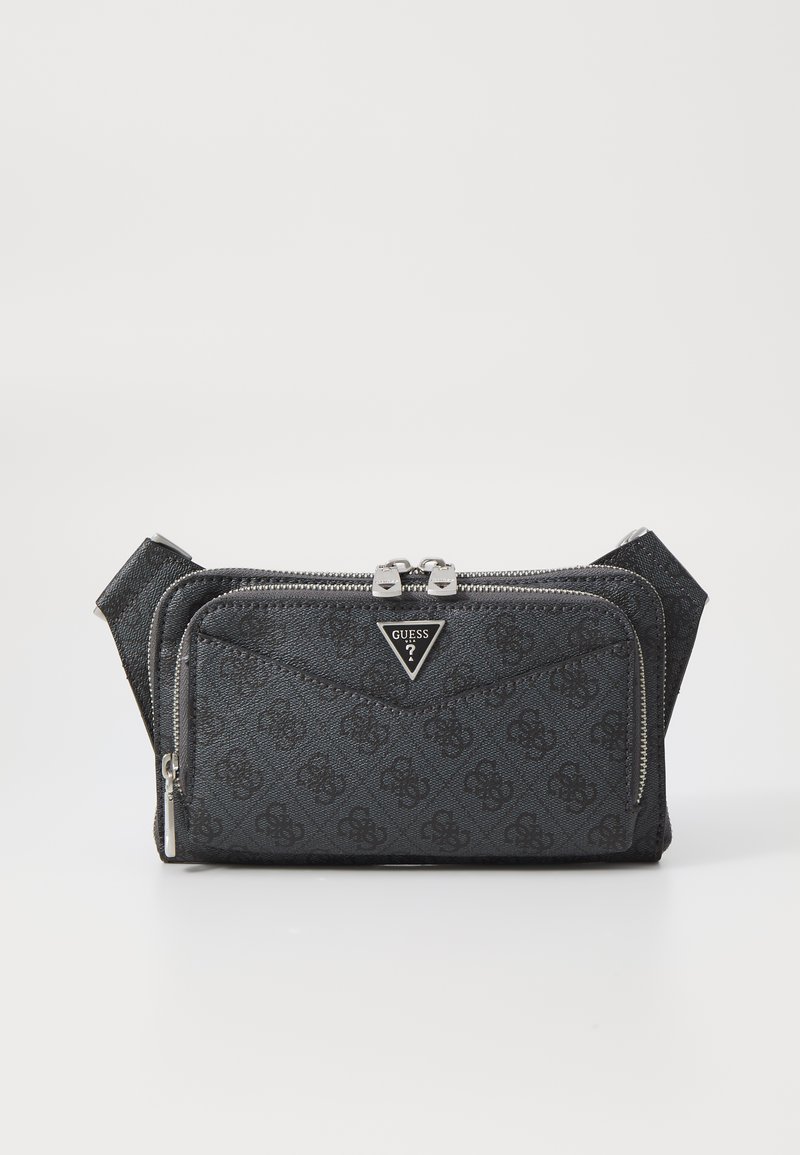 Mustikkakuosiselle olkalaukulle, joka on valmistettu teksturoidusta materiaalista. Laukussa on kaksinkertaiset vetoketjulliset osastot ja hopeinen logo.