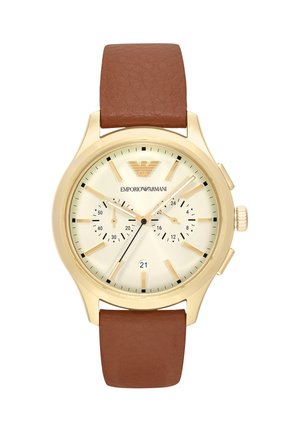 Emporio Armani analogt armbåndsur i guldfarve med hvid urskive, brun læderrem, to undermålere, datovindue og gyldne timeindikatorer.
